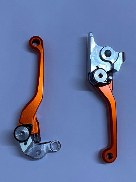 MANIJAS RETRACTILES DE CLUTCH Y FRENO CX RACING para KTM